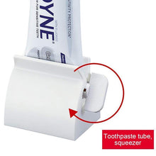 Load image into Gallery viewer, Rolling Tube Toothpaste Squeezer Toothpaste Holder Stand